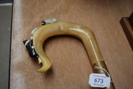 A Shepards crook depicting a figure of a sheepdog and sheep length 125cm
