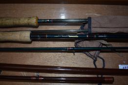 Three fly fishing rods A Daiwa Graphite trout 2pc 10ft #7-9 and a Shakespeare radial carbon 2pc 10ft