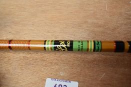 A Lee rod 3pc split cane 9ft 6in fly rod called black demon in soft sleeve in excellent condition