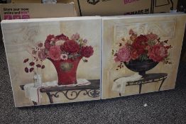 Two modern canvases showing flowers in vases on cream grouond.