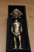A North African cast metal statue of a male covering his genitals. 16cm high.