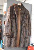A ladies vintage 3/4 length deep brown fur coat 40' chest approx.