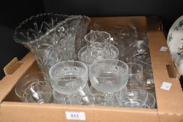 A carton of assorted cut glass and crystal items including vases, brandy glasses and dessert