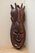 A large African carved hardwood tribal mask, measuring 66cm tall