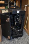 A 1930s Ensign SS300B film projector in case