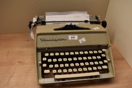 A vintage Remington Fleetwing typewriter.