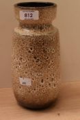 A West German pottery vase, with moulded neck and mottled brown glaze, marked W-Germany 242-22 to