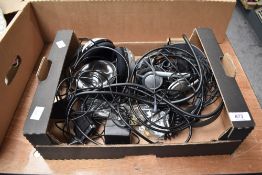 A pair of Philips wireless headphones sold along with a number of smaller headphones etc.