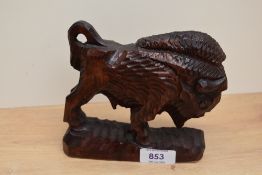 A 20th century carved bison study.