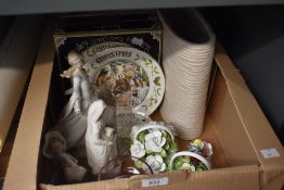Four Aynsley Christmas plates, two Aynsley posy baskets and a smaller similar, a glass swan and a