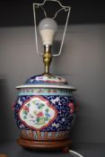 A vintage Chinese Export Famille-Rose enamelled ginger jar converted into a lamp.