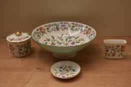 Four pieces of Minton Haddon Hall china comprising of a footed bowl signed by John Wadsworth, a