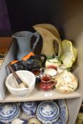 A vintage mortar and pestle, an Arthur Wood Garden Wall jug in blue, two sauce pots apple and