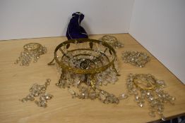A vintage 20th century gilt metal and clear glass six ring chandelier light fitting sold alongside