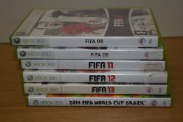 Six Xbox 360 games including Fifa 08, 09,11, 12 and 13 as well as the 2014 Fifa World Cup Brazil