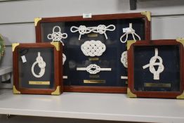Three cased displays of nautical knots, the largest measures 32cm x 48cm
