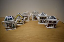 Six Wade 'English Life' novelty teapots.