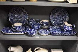 A selection of Burleigh blue and white Calico pattern dinner and tea wares, transfer printed in