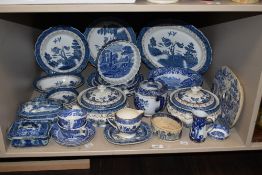 A large collection of blue and white ware including a Copeland Spode 'Italian' dish and quiche dish,