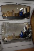 An Art Deco frameless bevelled edge glass mirror, measuring 70cm long, and another frameless