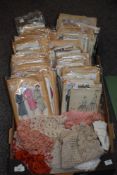 A large collection of vintage/mid century/retro sewing patterns and a number of crotched table