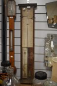 A 19th Century mahogany cased Admiral Fitzroy barometer, with paper dial, mercury barometer and