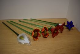 A group of six attractive Maltese art glass long stemmed flowers, each with variations 48cm