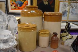 Five salt glazed containers including two lidded pots stamped 4lb to lid and 80oz to body to one and