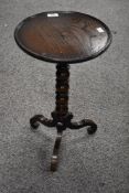 A vintage oak wine table, having carved collumn.
