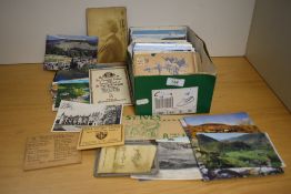 A selection of postcards of mixed genres including tourist spots, architecture, the Lake District,