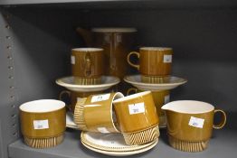 A 1960's Poole Pottery Choisya pattern coffee set, comprising coffee pot, six cups, six saucers,