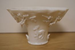 An interesting 18th/19th century Chinese blanc-de-chine Dehua porcelain libation cup or Jue, of