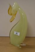 A vintage Continental uranium and amber glass duck figure of stylised form, 23.5cm high fluoresces