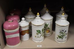 A group of six Limoges 'Warin' apothecary Lidded Jars, white ground decorated with flowers and