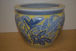 An attractive 20th century Chinese pottery fish bowl jardinière, transfer printed and hand