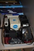 A collection of camera equipment, Minolta 28/2.8 MD lens, Vivitar flash, vintage Kodak camera etc.