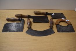 A mid-20th Century double handled herb chopper, together with two further vintage herb choppers