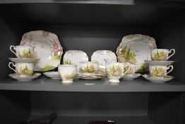 A 1930s Royal Albert Kentish Rockery patterned tea set, comprising teacups, saucers, sucrier,
