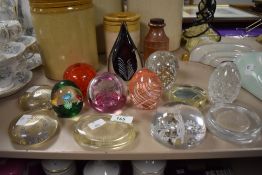 Thirteen assorted paperweights including Caithness and two D&W Gibbs Cold Cream Soap advertising