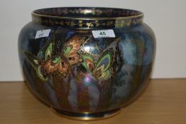 A Fielding's Crown Devon 'Rural Lustrine' butterfly lustre jardinière, decorated with gilt