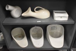 A group of English glazed ironstone sanitary wares, three slipper pans, two 'bed pans' and a Jeyes