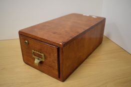 A vintage mahogany filing draw, having lock but no key.
