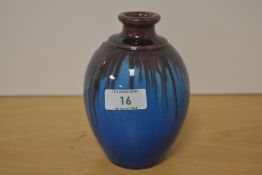 A continental pottery drip-glazed ovoid vase with short raised neck and rim, unmarked 14cm