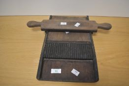 A 19th century brass and mahogany Apothecary pill roller, of traditional design