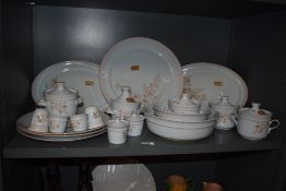 Approximately twenty one pieces of Denby 'Normandy' stoneware including three covered soup dishes