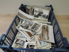 POSTCARDS AND TRADE CARDS COLLECTION IN BOX Old box with a variety of postcards ,UK and overseas,