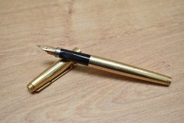 A Parker 75 aerometric fill fountain pen in rolled gold.