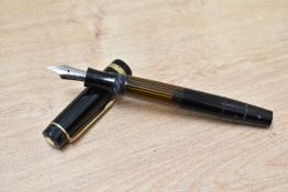 A Montblanc Miesterstuck 134 piston fill fountain pen in black having a 4810 M nib
