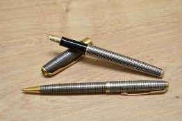A Parker Sonnet converter fill fountain pen and ballpoint pen in Cicele with gold trim
