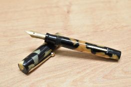 A Sheaffer Lifetime Flat top lever fill fountain pen in black and pearl with white spot and single